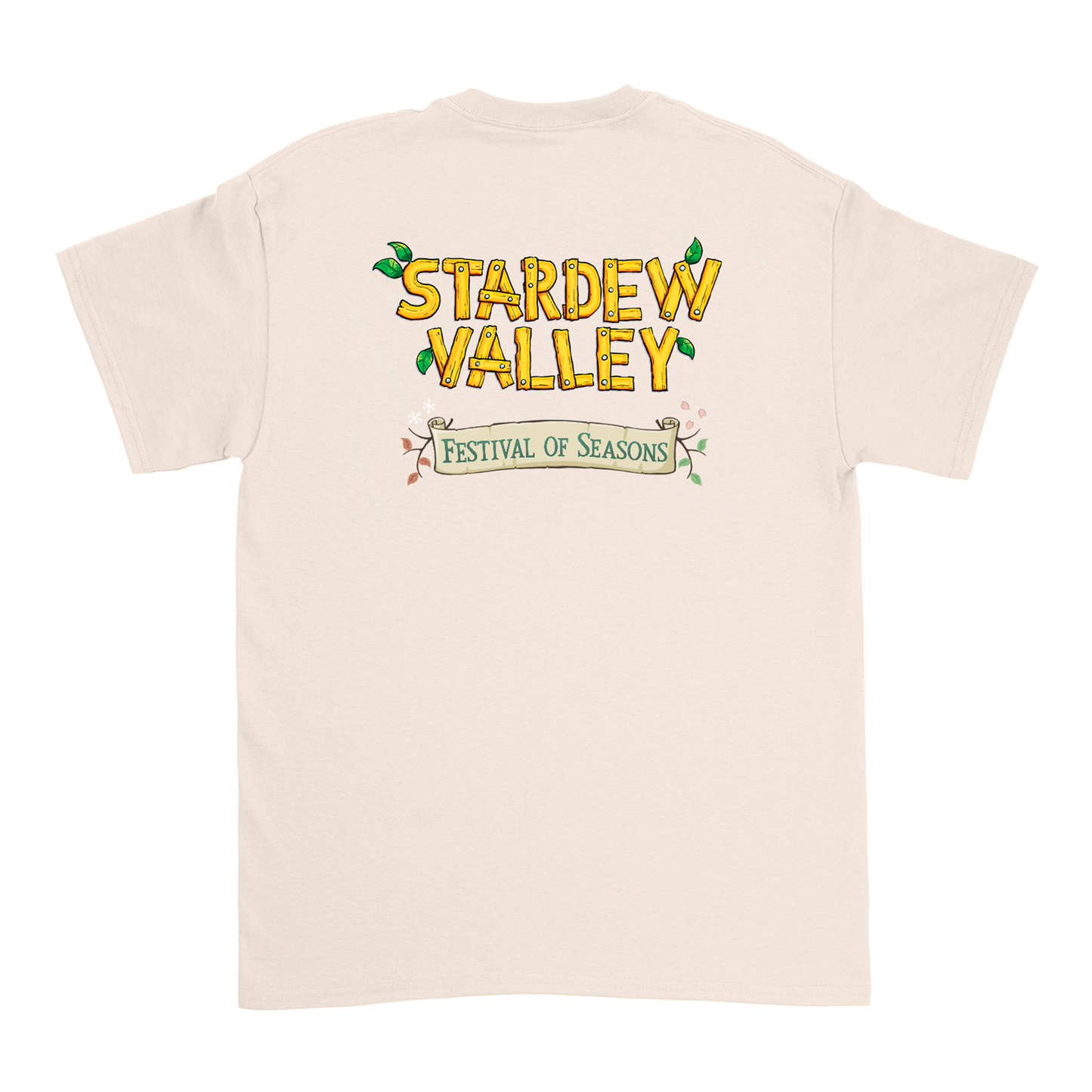Cream-colored short-sleeved t-shirt featuring a ’stardew valley festival of seasons’ graphic with yellow, green, and brown illustrated text.
