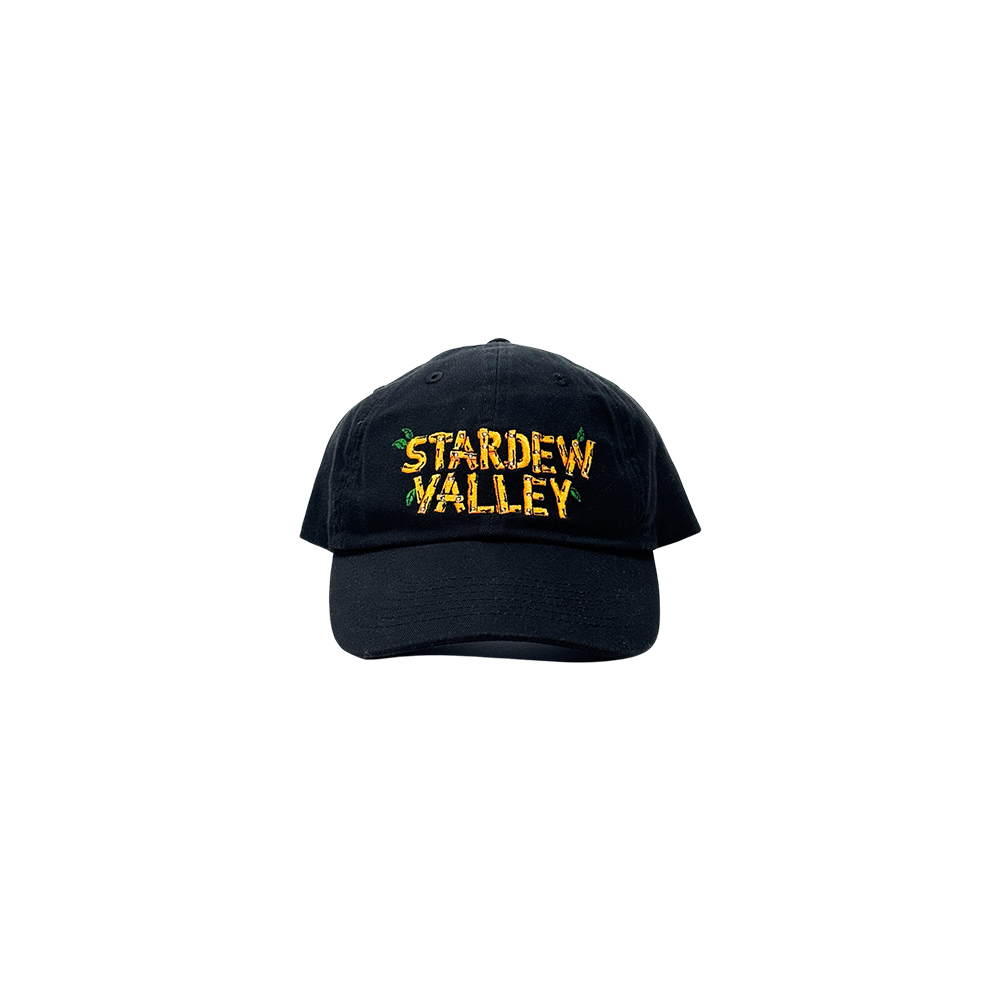 Black baseball cap with ’STARDEW VALLEY’ embroidered in yellow on the front.