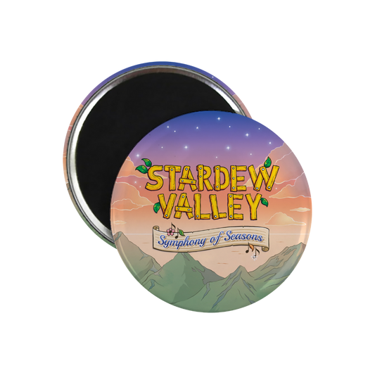 Circular magnet featuring the ’stardew valley: symphony of seasons’ artwork with a gradient sky, mountains, and yellow text.