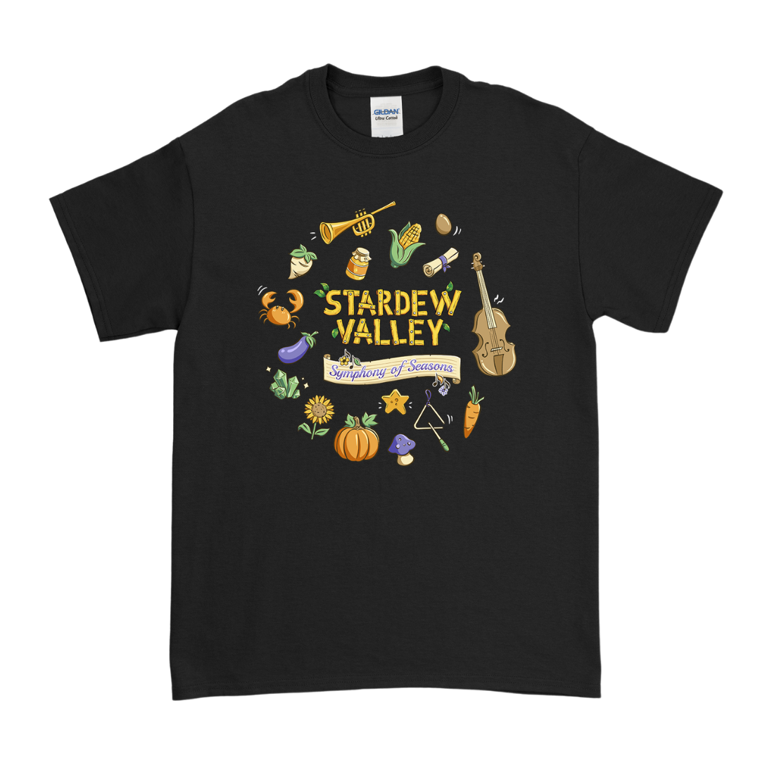 Black short-sleeved t-shirt featuring a colorful circular design with ’stardew valley’ and ’symphony of seasons,’ surrounded by illustrated farm items, musical instruments, vegetables, fruits, mushrooms, and other seasonal elements.