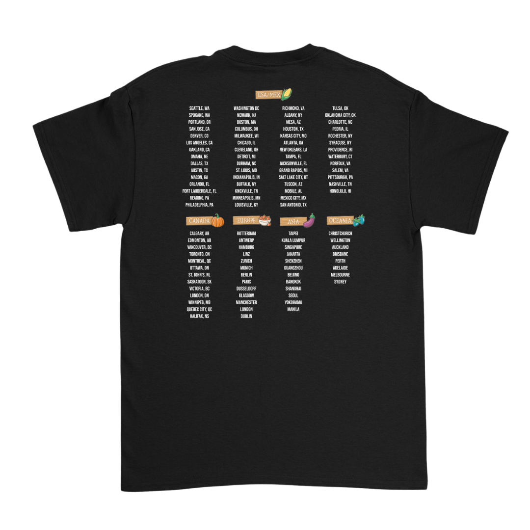 Black cotton t-shirt featuring a detailed tour itinerary printed in white text with colorful seasonal icons.